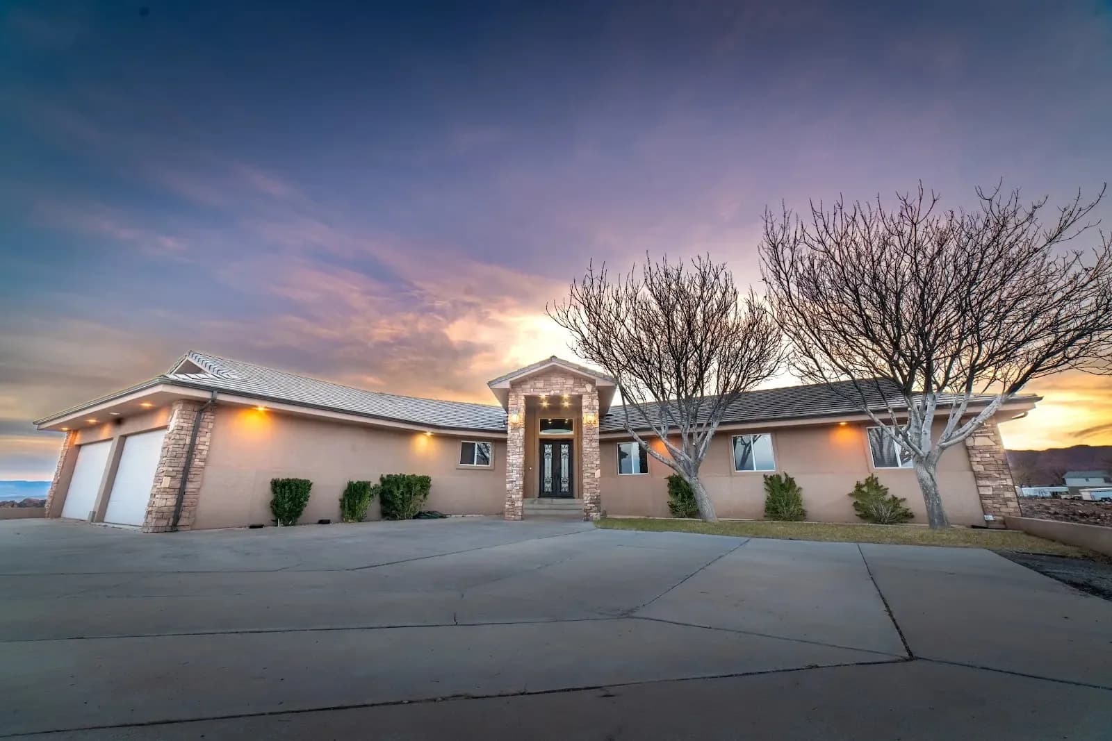 Front of the Renaissance Ranch St. George residential house at dusk